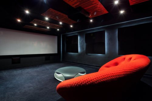 Check this cool movie room with projector in the basement